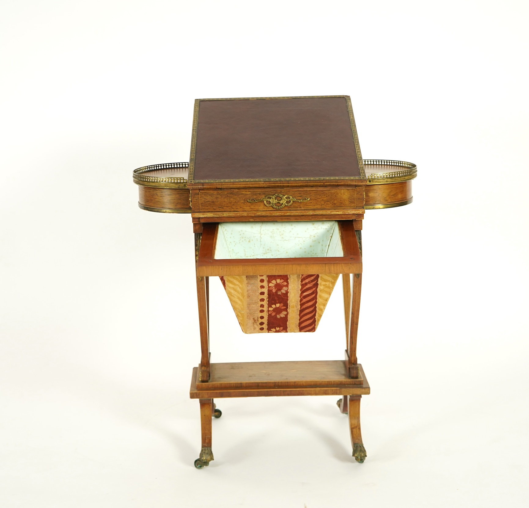 A Regency brass mounted rosewood writing, games and work table